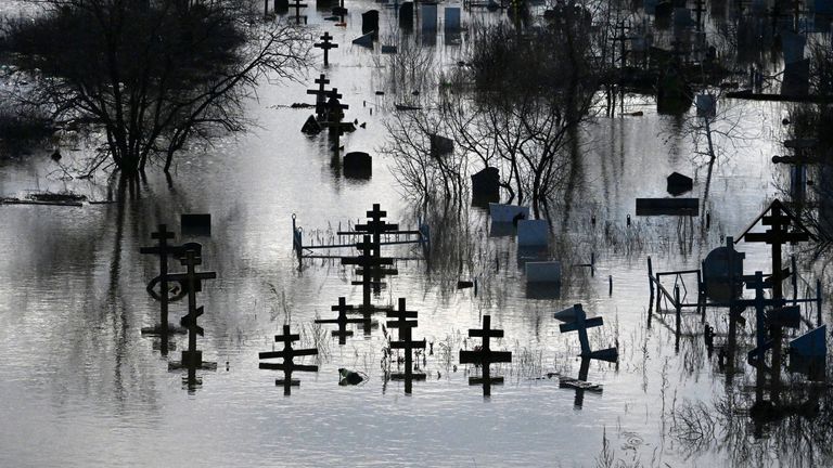A flooded graveyard in Orsk. Pic: AP