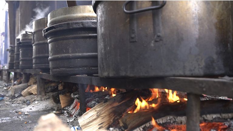 A makeshift wood-fired stove