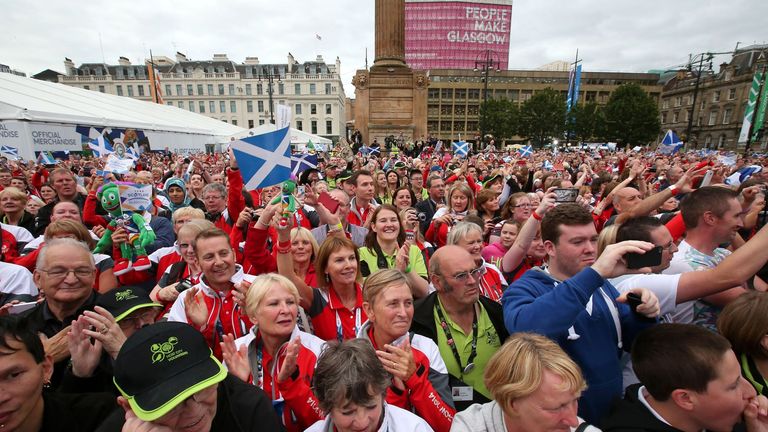 Crowds in George Square during the Commonwealth Games parade in Glasgow. PRESS ASSOCIATION Photo. Picture date: Friday August 15, 2014. See PA story SPORT Scotland. Photo credit should read: Andrew Milligan/PA Wire.  