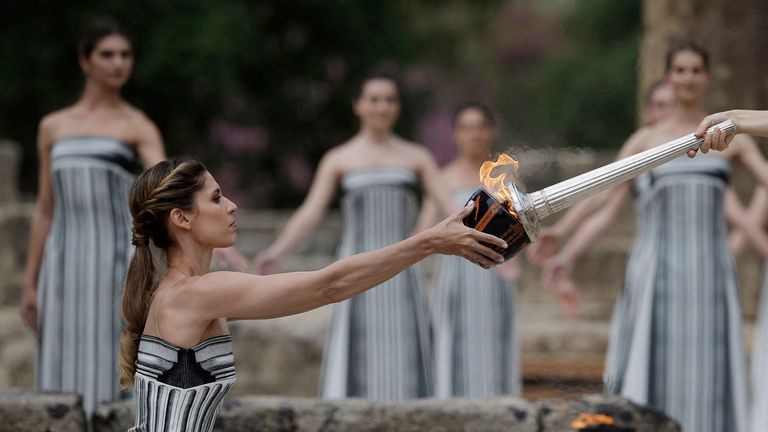 Greek actress Mary Mina, playing the role of High Priestess, lights the flame during the Olympic Flame lighting ceremony for the Paris 2024 Olympics.
Pic: Reuters