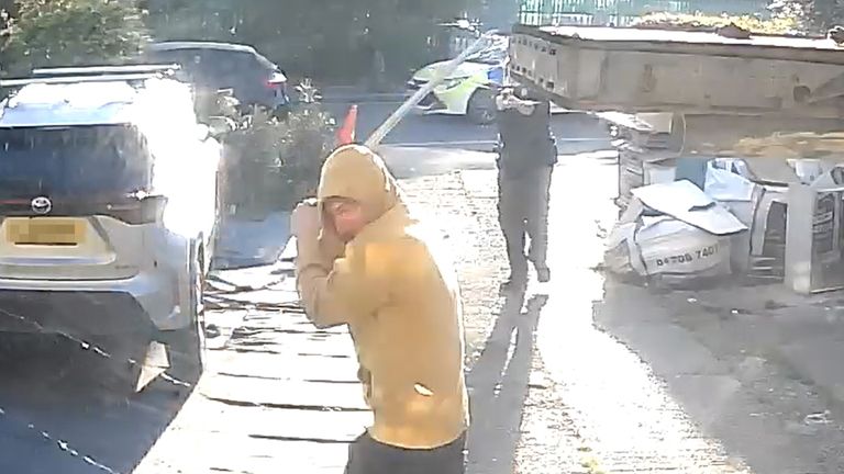  Handout footage from a doorbell camera of police officers tasering a sword-wielding man in Hainault, north east London, after a 14-year-old boy died after being stabbed following an attack on members of the public and two police officers. Pic: PA