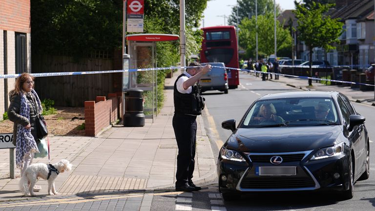 Pic: Jordan Pettitt/PA 
Police talking to members of the public at the scene in Hainault, north east London, after reports of several people being stabbed at a Tube station. A 36-year-old man wielding a sword was arrested following the attack on members of the public and two police officers. Picture date: Tuesday April 30, 2024. PA Photo. See PA story POLICE Hainault. Photo credit should read: Jordan Pettitt/PA Wire