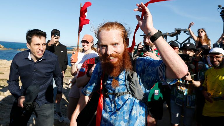 Britain&#39;s Russ Cook becomes the first person to run the entire length of Africa - Tunisia - April 7, 2024 Britain&#39;s Russ Cook reacts after becoming the first person to run the entire length of Africa REUTERS/Zoubeir Souissi