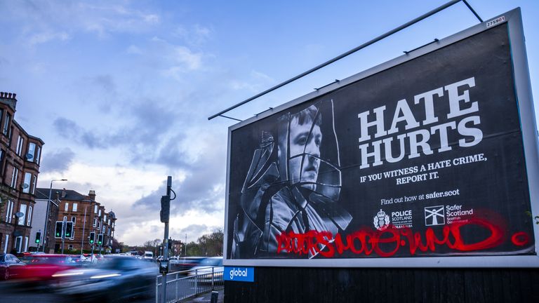 A Scottish Government and Police Scotland hate crime billboard in Dennistoun, Glasgow. The Hate Crime and Public Order (Scotland) Act criminalises &#39;threatening or abusive behaviour&#39; intended to stir up hatred against someone&#39;s identity. It extends protection to groups including religion, age, disability, sexual orientation, and transgender identity, applying in people&#39;s private homes and online. Picture date: Saturday April 13, 2024.