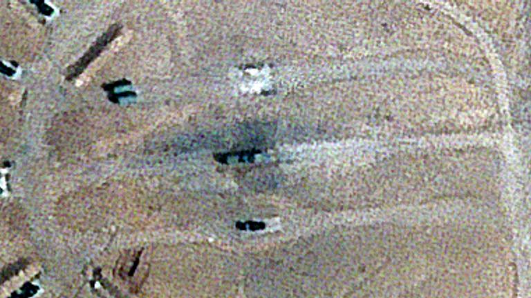 Burn marks surround what analysts identify as a radar system for a Russian-made S-300 missile battery, center, near an international airport and air base is seen in Isfahan, Iran, Monday, April 22, 2024. Satellite photos taken Monday suggest an apparent Israeli retaliatory strike targeting Iran's central city of Isfahan hit a radar system for a Russian-made air defense battery, contradicting repeated denials by officials in Tehran in the time since the assault. (Planet Labs PBC via AP)