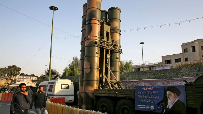 FILE - A Russian-made S-300 air defense system sits on display for the annual Defense Week, marking the 37th anniversary of the 1980s Iran-Iraq war, at Baharestan Square in Tehran, Iran, Sept. 24, 2017. Satellite photos taken Monday suggest an apparent Israeli retaliatory strike targeting Iran&#39;s central city of Isfahan hit a radar system for a Russian-made air defense battery, contradicting repeated denials by officials in Tehran in the time since the assault. (AP Photo/Vahid Salemi, File)
