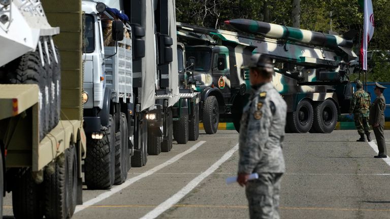 Missiles are carried on trucks during Army Day parade at a military base in northern Tehran, Iran. Pic: AP