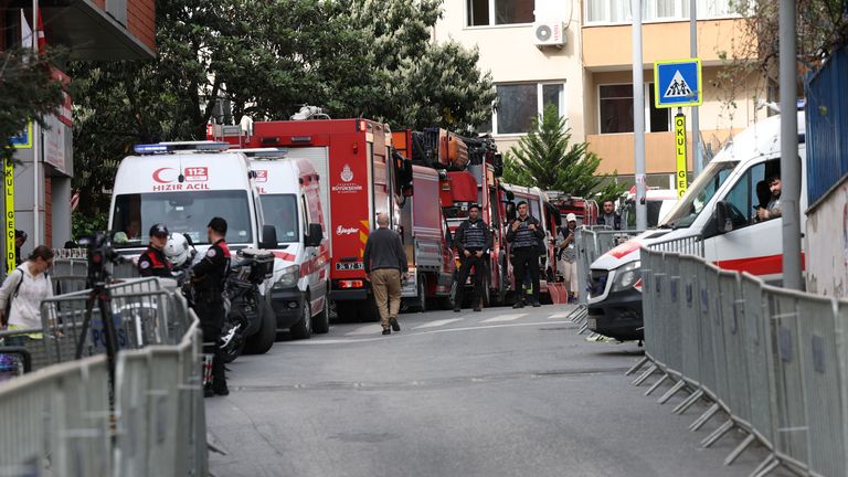 Ambulances and frie trucks are seen near the scene after a fire broke out during daytime renovation work at a nightclub in Istanbul, Turkey April 2, 2024. REUTERS/Murad Sezer
