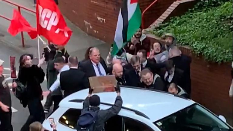 Jacob Rees-Mogg chased by pro-Palestinian protesters in Cardiff. Pic credit: Arthur Newman