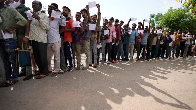 People hold their voting slips as they queue up to vote during the second round of voting in the six-week-long national election in Jammu, India .
Pic: AP