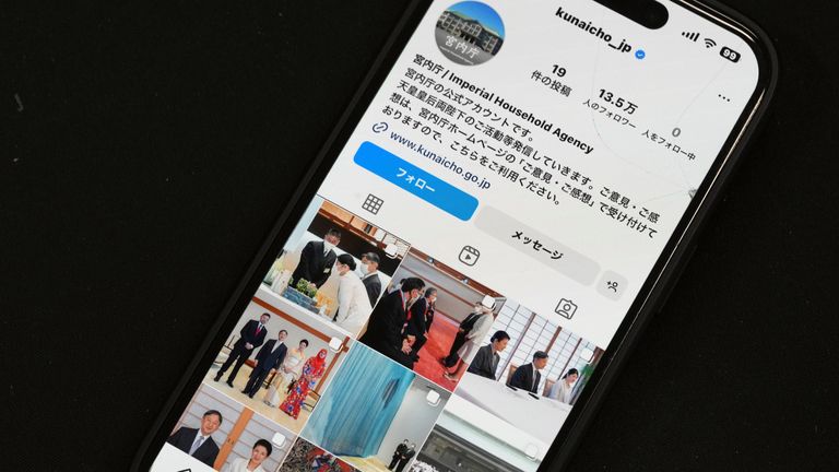 The instagram page of Japan&#39;s Imperial Household Agency is seen on a mobile phone Monday, April 1, 2024, in Tokyo. Japan...s Imperial Family made an Instagram debut on Monday, with images of Emperor Naruhito and Empress Masako capturing moments of their official duties, an effort to shake off their cloistered image and reach out to the younger generations.(AP Photo/Eugene Hoshiko)