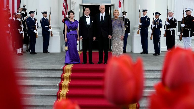 President Joe Biden, center right, and first lady Jill Biden, right, welcome Japanese Prime Minister Fumio Kishida, center left, and his wife Yuko Kishida for a State Dinner at the White House, Wednesday, April 10, 2024, in Washington. (AP Photo/Susan Walsh)