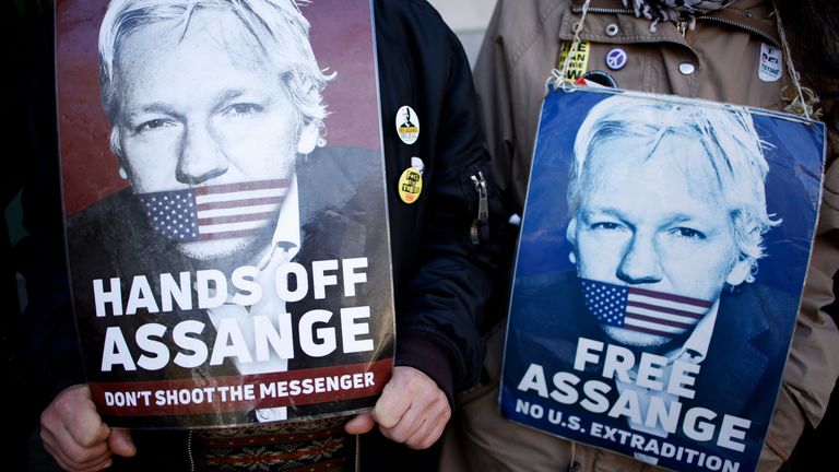 Activists show their support for Julian Assange in London on 14 April. Pic: AP