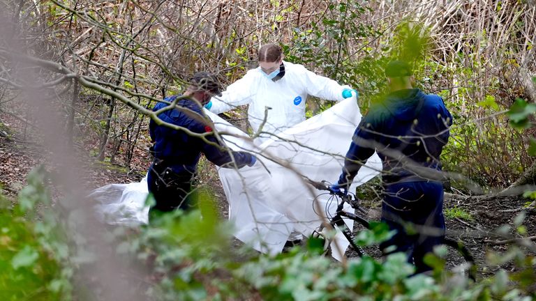 Police and forensic officers at Kersal Dale.
Pic: PA