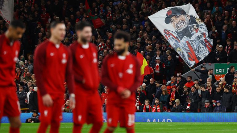 Football - Europa League - Round of 16 - Second leg - Liverpool v Sparta Prague - Anfield, Liverpool, England - March 14, 2024 Liverpool fans hold a photo of manager Jurgen Klopp in the stadium before the game Flag action image via Reuters/Lee Smith