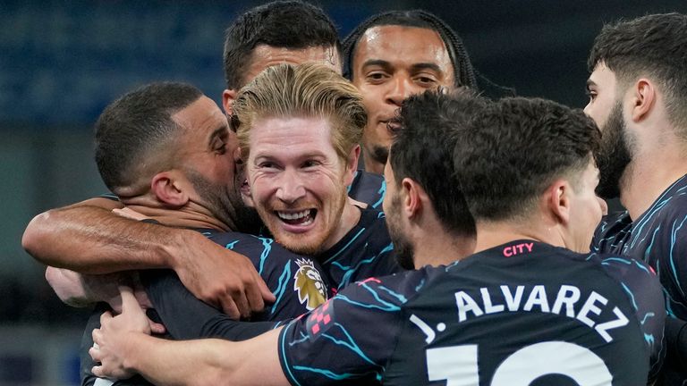 Manchester City's Kevin De Bruyne celebrates with his teammates after scoring his team's opening goal during the English Premier League football match between Brighton and Manchester City at Falmer Stadium in Brighton, England, Thursday, April 25, 2024. (AP Photo/Kin Cheung)