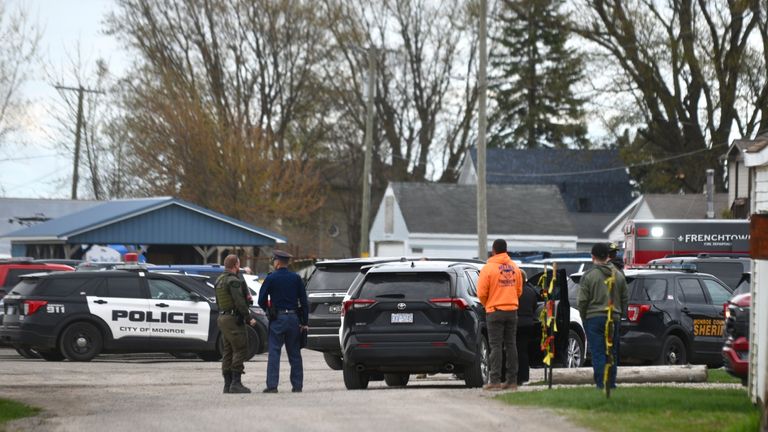 Authorities respond to the Swan Creek Boat Club after a driver crashed a vehicle through a building where a children's birthday party was being held, Saturday, April 20, 2024, in Berlin Township, Michigan (Kathleen Kildee/ Detroit News via PA)