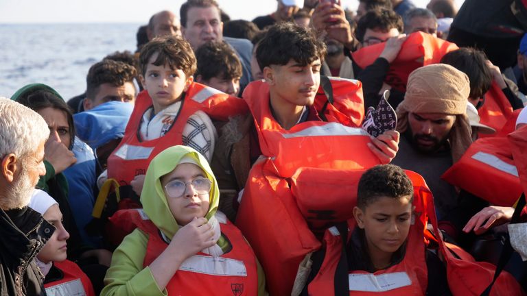 A group of migrants being rescued from the Mediterranean Sea last year. Pic: AP