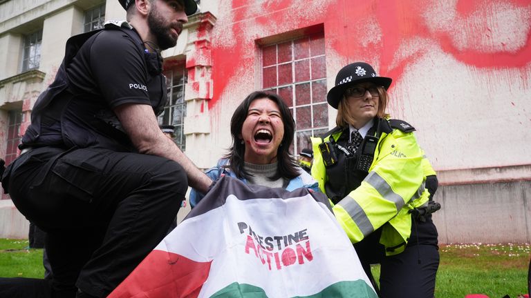 Police detained a man after members of Youth Demand threw red paint outside the Ministry of Defense building in London. Image date: Wednesday, April 10, 2024.
