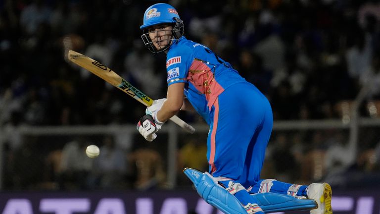 Mumbai Indians Nat Sciver-Brunt plays a shot during during the Women&#39;s Premier League Twenty20 cricket final match between Delhi Captials and Mumbai Indians in Mumbai, India, Sunday, March 26, 2023. (AP Photo/Rajanish Kakade)