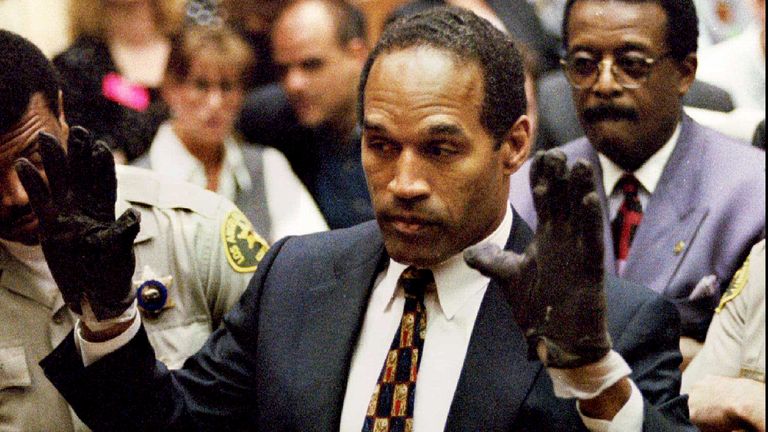 Defendant OJ Simpson wearing the blood stained gloves found by Los Angeles Police.
Pic: Reuters