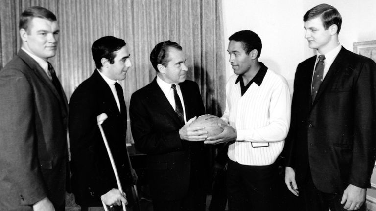 U.S. President-elect Richard M. Nixon meets members of a college All-Star team in his Pierre Hotel suite as is presented with an autographed football from OJ Simpson.
Pic: AP
