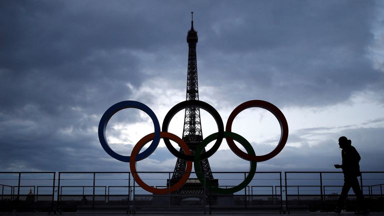 FILE PHOTO: Olympic rings to celebrate the IOC official announcement that Paris won the 2024 Olympic bid are seen in front of the Eiffel Tower at the Trocadero square in Paris, France, September 14, 2017. REUTERS/Christian Hartmann/File Photo