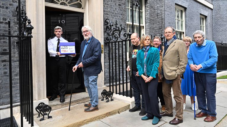 The hosts of The Movers and Shakers podcast outside Number 10. Pic: PA