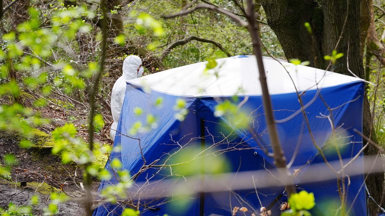 Police and forensic officers at Kersal Dale, near Salford .
Pic: PA
