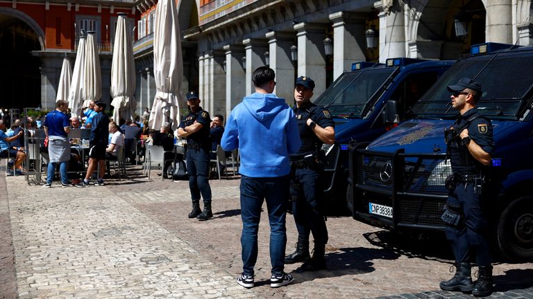 Police in Madrid ahead of the match.
Pic: Reuters