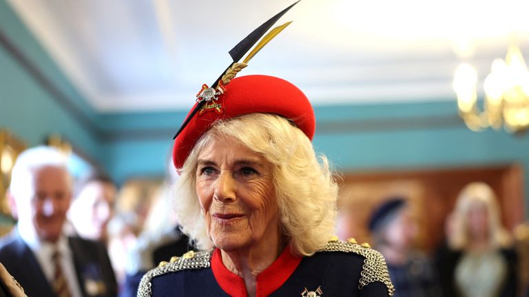 Queen Camilla looks on during a visit to The Royal Lancers.
Pic: Reuters
