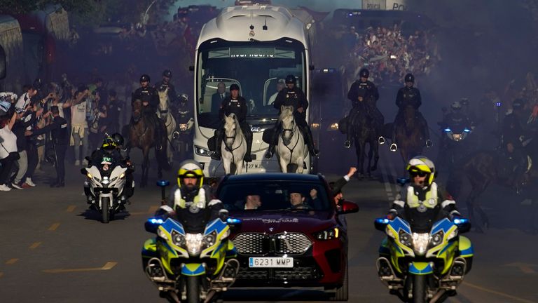Police escorting Real Madrid players to the stadium. Pic: AP