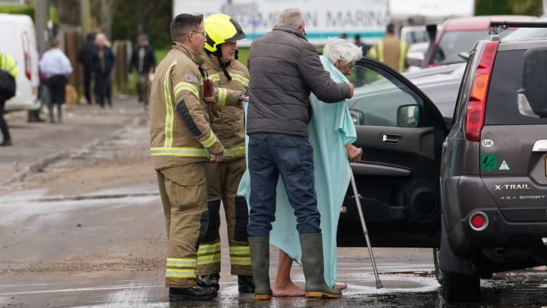 Firefighters evacuate an elderly resident near Rope Walk in Littlehampton, West Sussex, after the River Arun burst its banks overnight.
Pic: PA