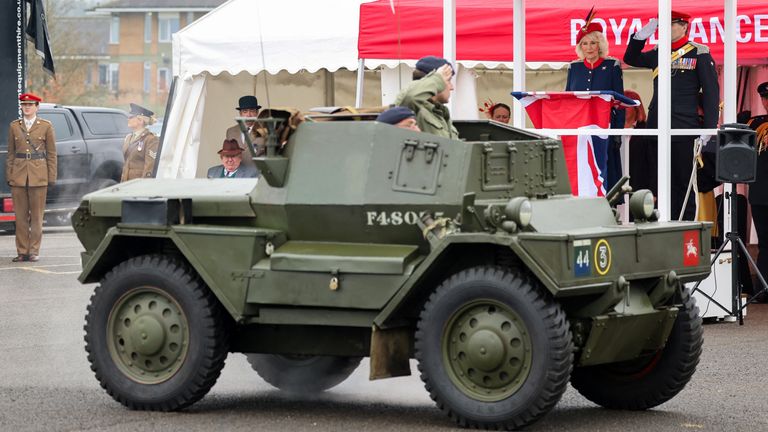 A Dingo armoured vehicle from WW2 parades past Britain&#39;s Queen Camilla during a visit to The Royal Lancers.
Pic: Reuters