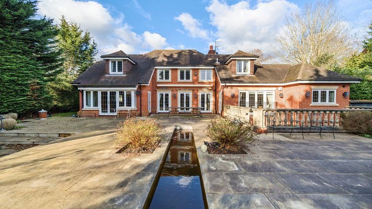 Exterior of the five-bedroom house in Jordans Village, Beaconsfield, Buckinghamshire. Pic: Landwood Property Auctions/PA