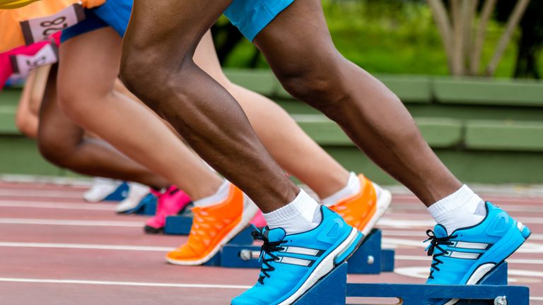 Group of athletes at the track ready to run. Pic: iStock