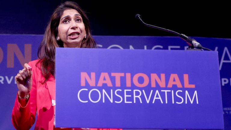 Suella Braverman gestures she gives a keynote speech at National Conservatism conference  in Brussels.
Pic: Reuters