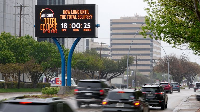 Information regarding the total solar eclipse is shown on a digital bill board as drivers make their way down a busy road in Addison, Texas, Thursday, March 21, 2024. Pic: AP Photo/Tony Gutierrez