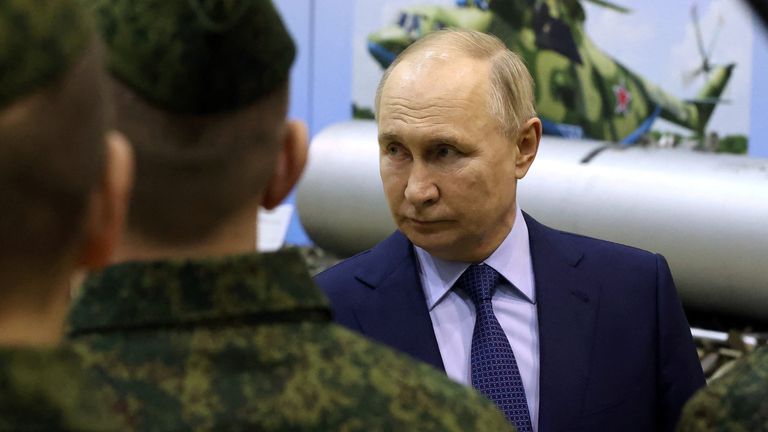 Vladimir Putin meets military pilots in the Tver region of Russia. Pic: Reuters