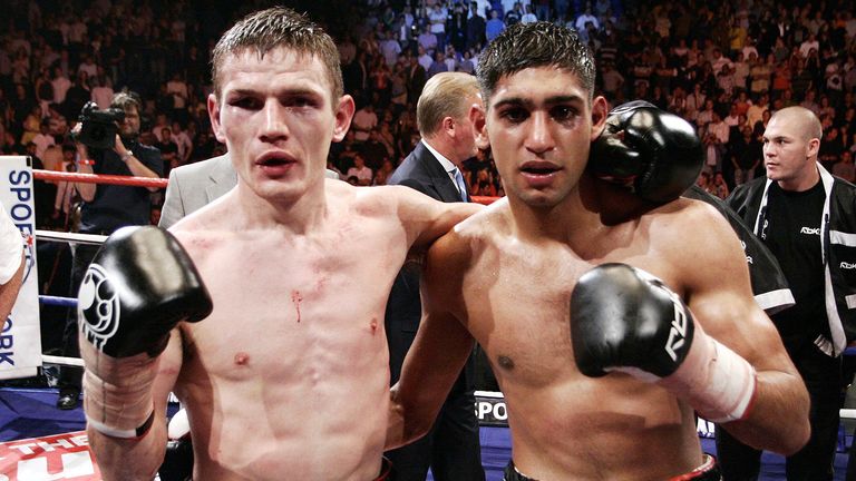 Willie Limond and fight winner Amir Khan at the end of the  fight..
Pic: Reuters