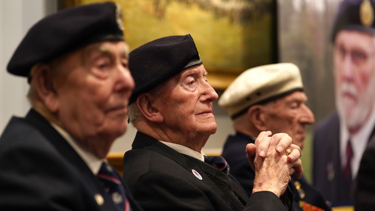 Normandy veteran and ambassador for the British Normandy Memorial, Stan Ford (centre), 98, who served with the Royal Navy. Pic: PA
