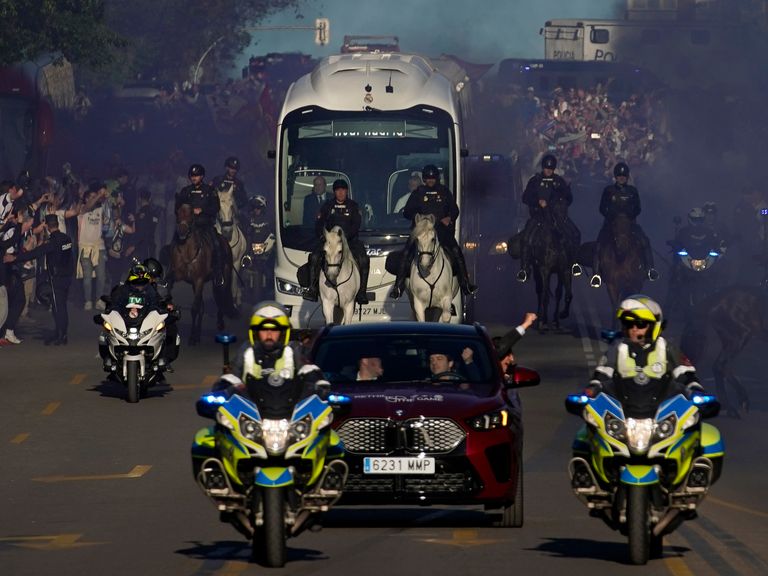 Police escorting Real Madrid players to the stadium. Pic: AP