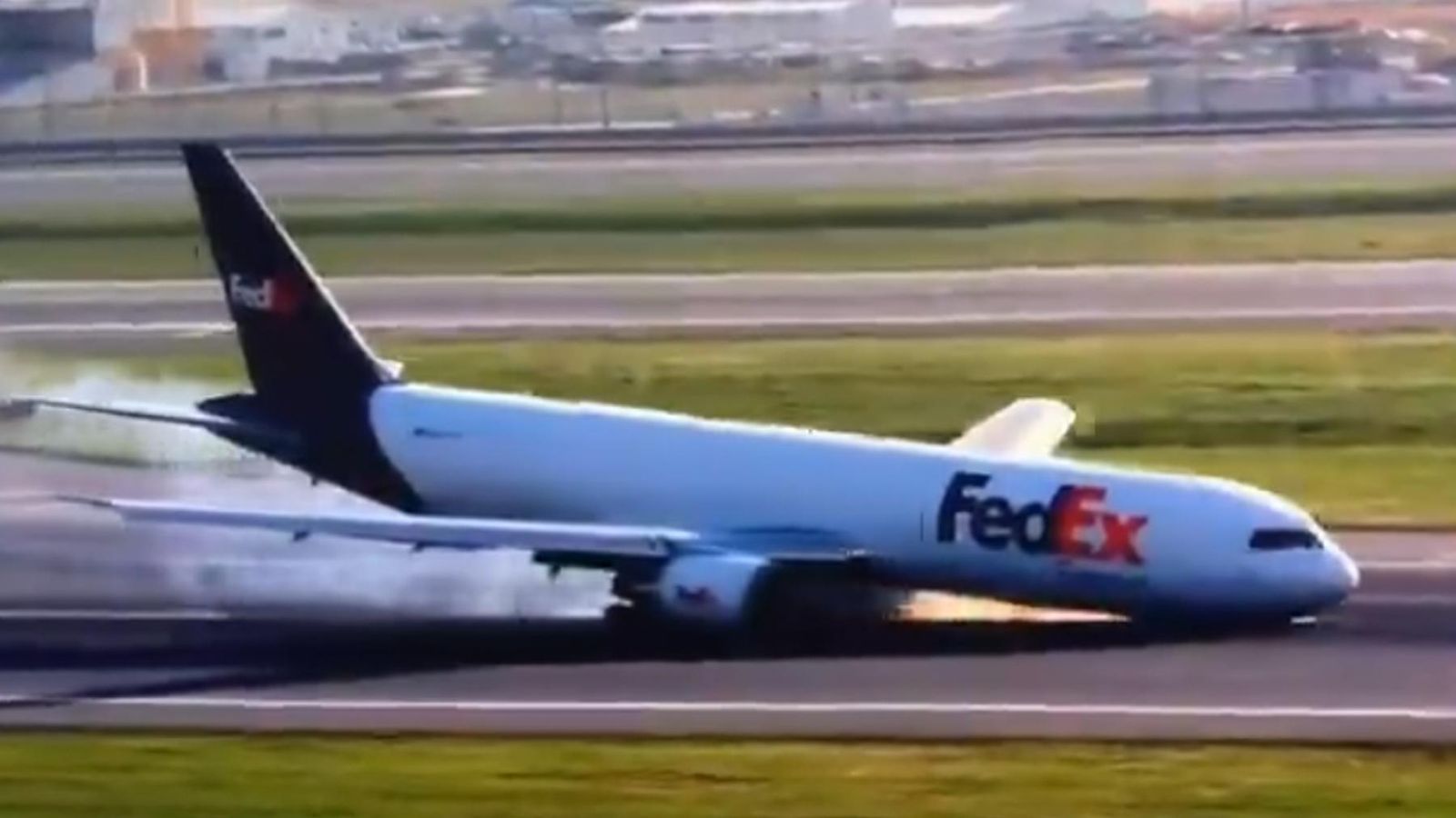Istanbul Airport: Boeing cargo plane drags across runway sending sparks flying