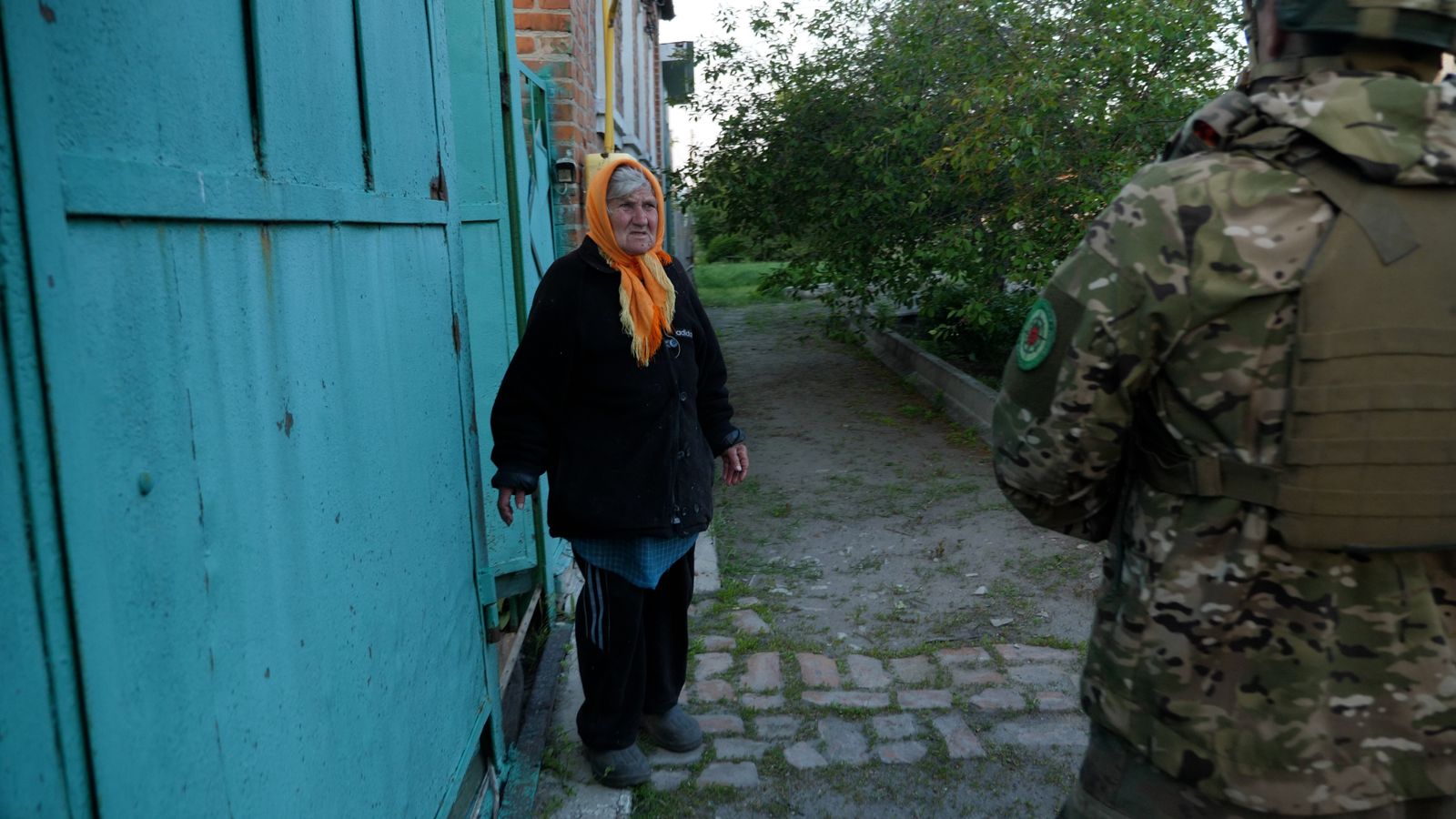 Terror, grief and rising smoke leave streets completely empty - as Ukrainians flee border town's fiercest attack yet