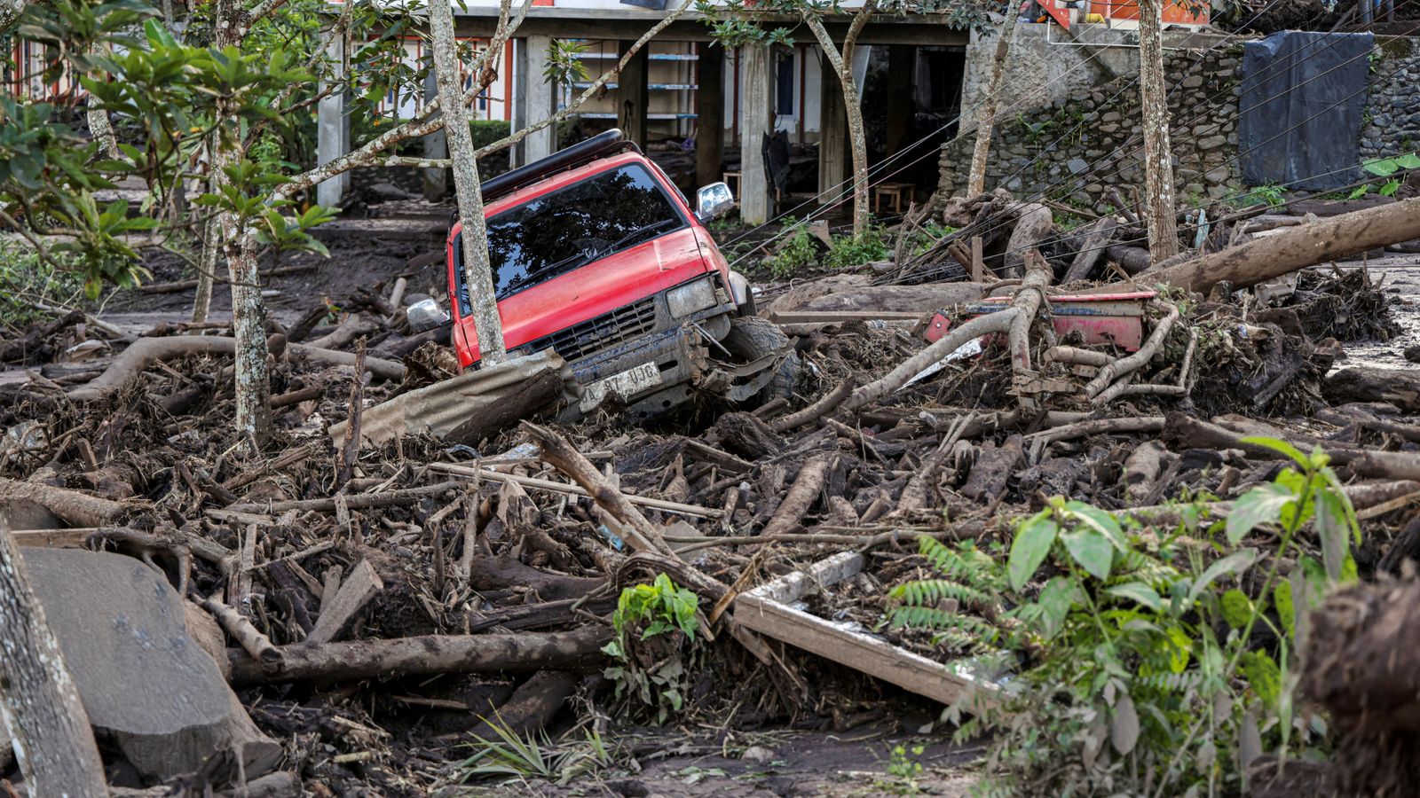 Cold lava landslides and flash floods leave 43 dead in Indonesia after