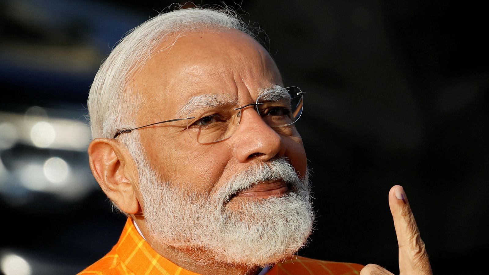 Modi casts vote in election as fears grow among India's Muslims