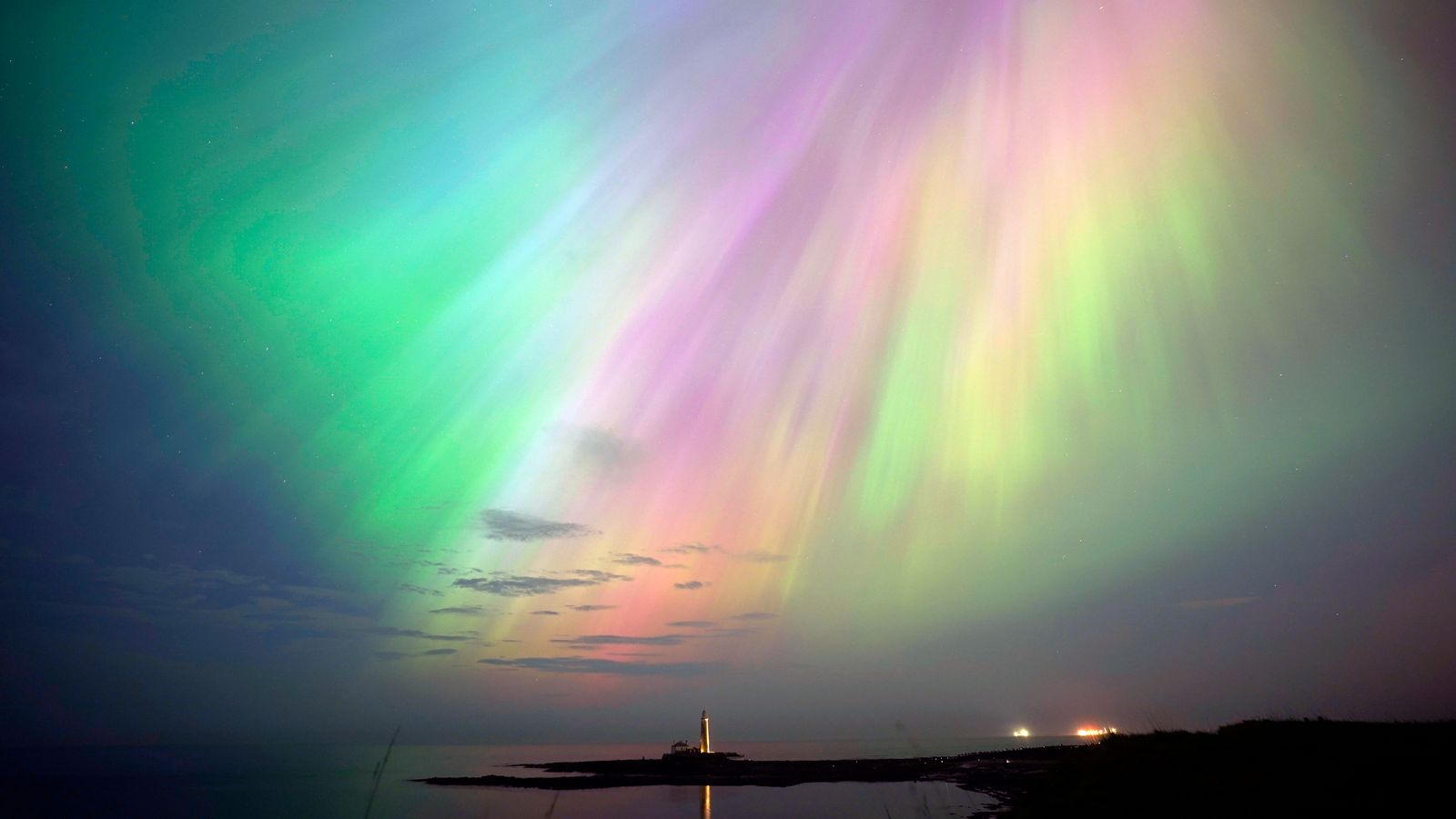 Northern Lights glow up skies across UK and around the world – see best pictures here