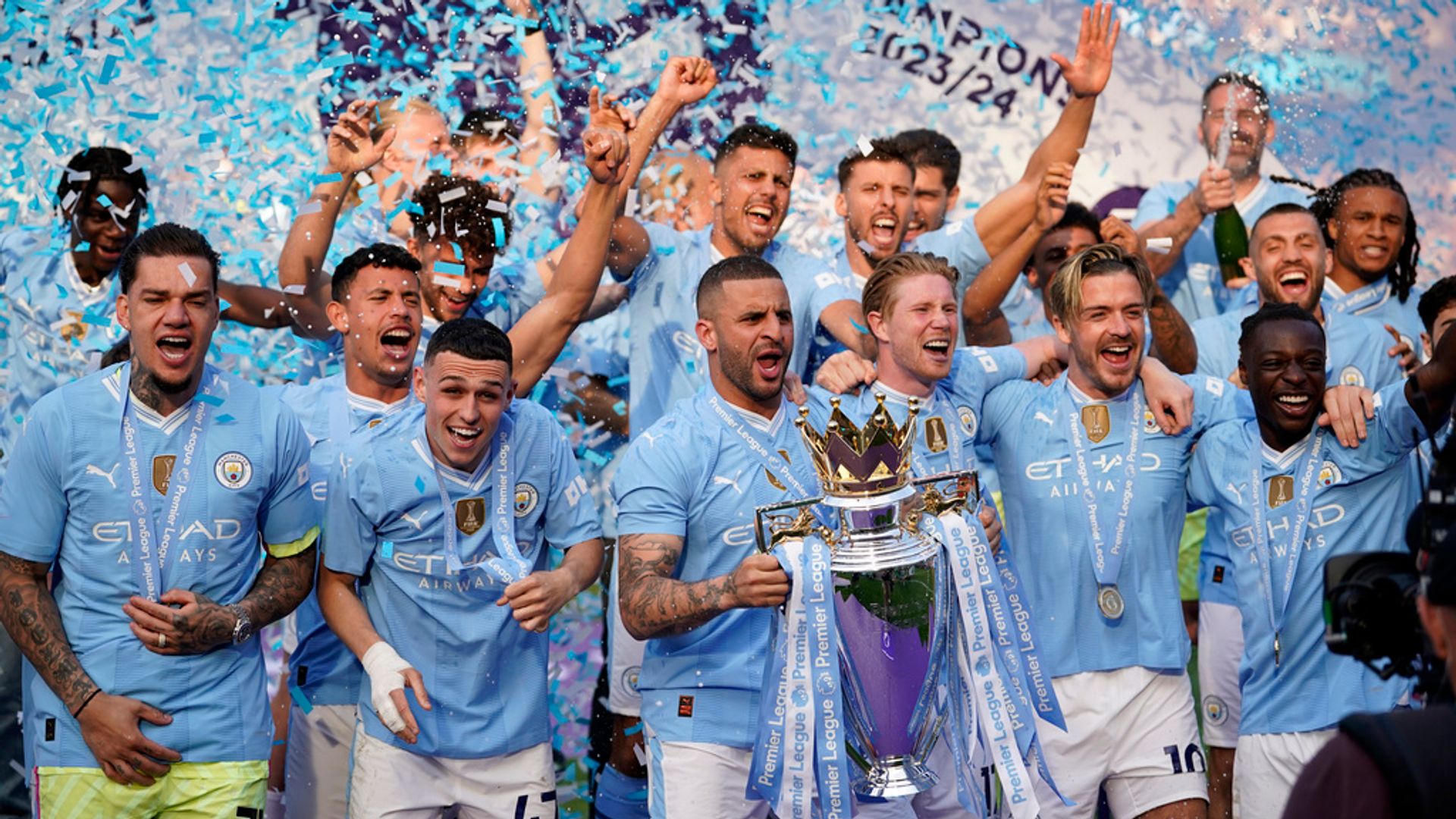 Man City win record-breaking fourth Premier League title in a row...