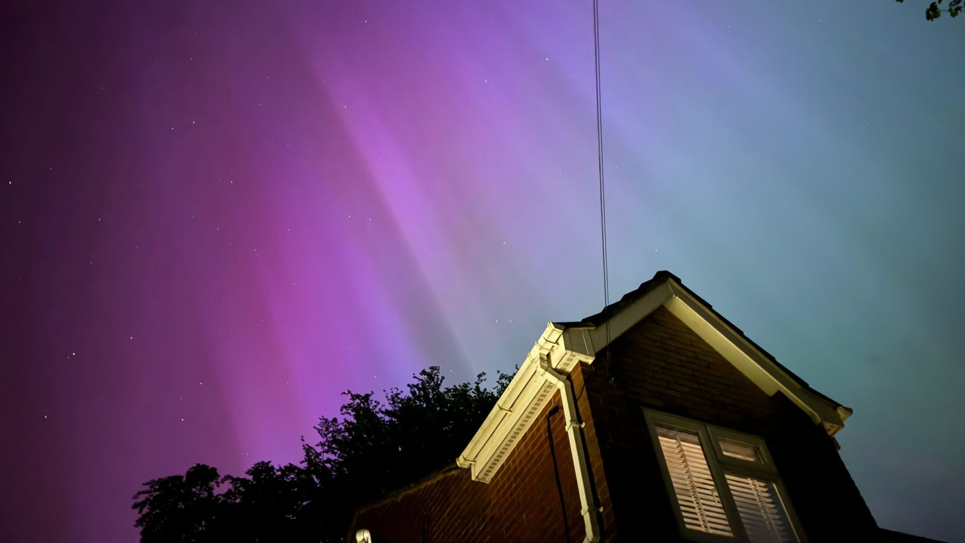 Northern Lights glow up skies across UK - see best pictures here