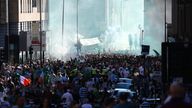 Celtic fans celebrate after winning the cinch Premiership in the city centre in Glasgow, Scotland. Picture date: Saturday May 18, 2024.